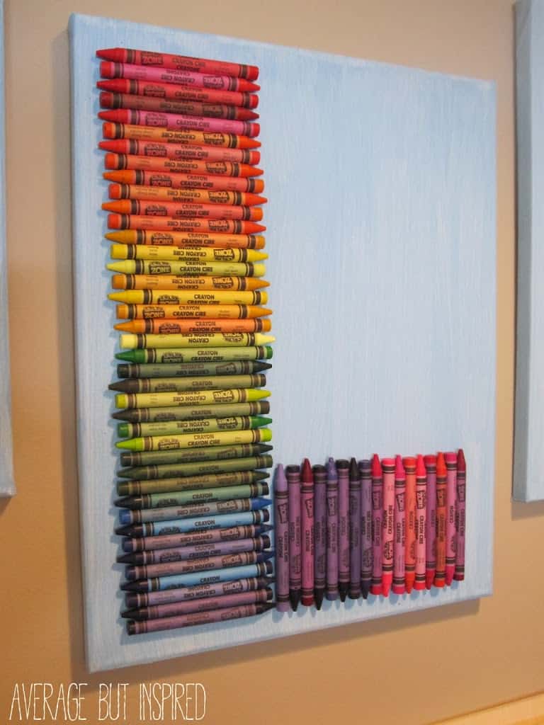 Make your own kids playroom art with fun supplies like crayons!