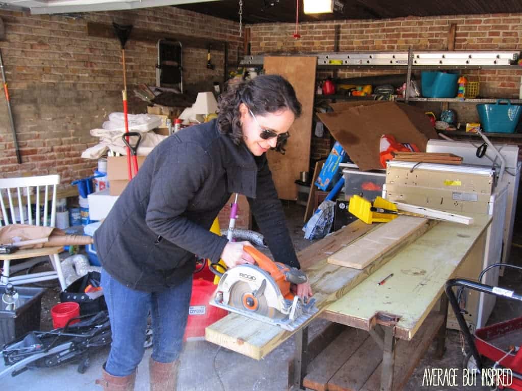 Cut wood pieces from a 4x6 to create the bottom of the DIY brass base terrarium.