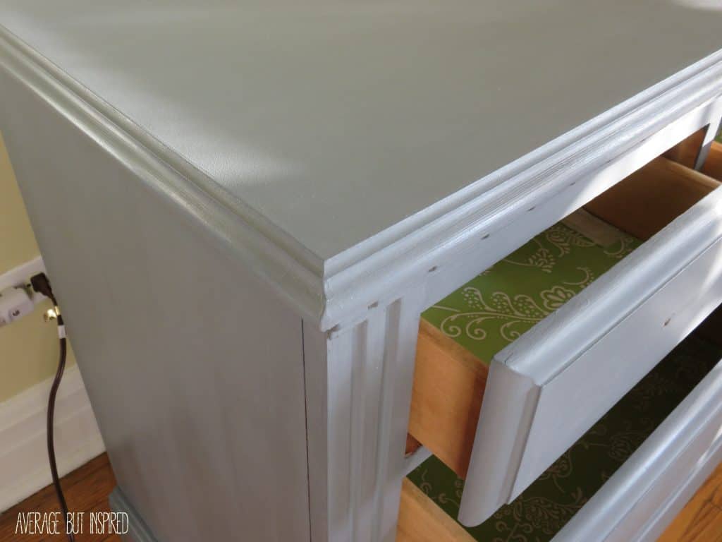 After the second coat of gray chalk paint, this dresser makeover started coming together.