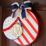 This unique embroidery hoop wreath will add a perfect touch of Americana to your front door for any patriotic holiday!