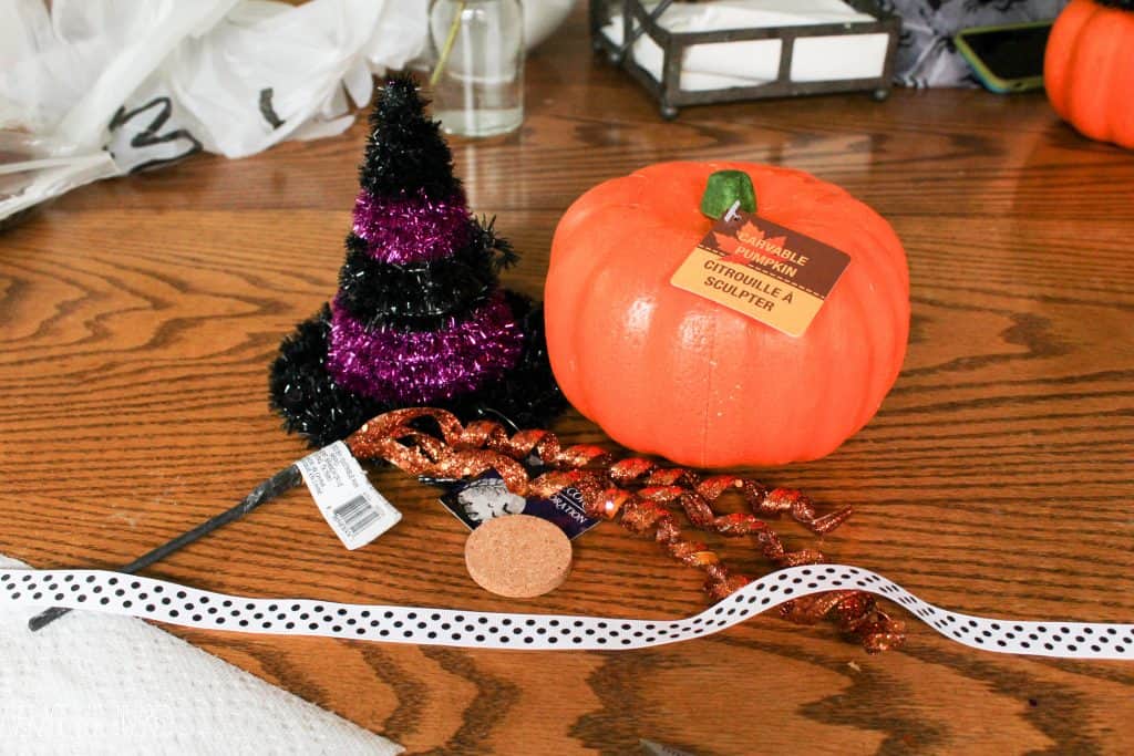 Turn a fake pumpkin into an adorable witch craft for Halloween!