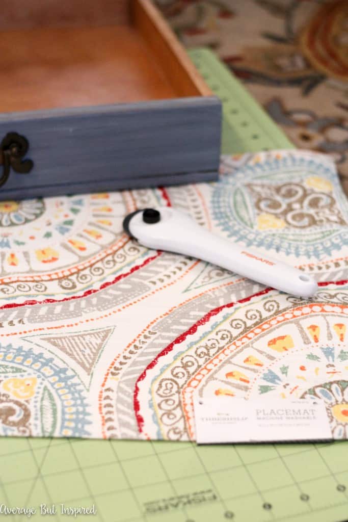 Use a placemat to line a drawer.