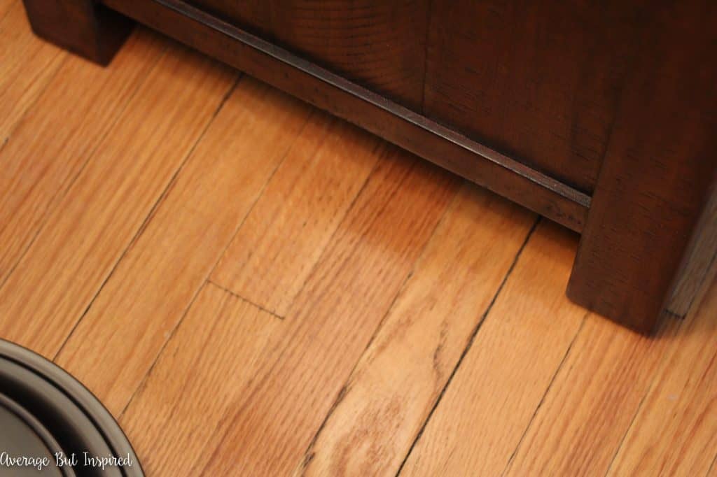 You don't have to live with scratched hardwood floors! There is a super easy way to fix shallow scratches and it doesn't cost a lot!