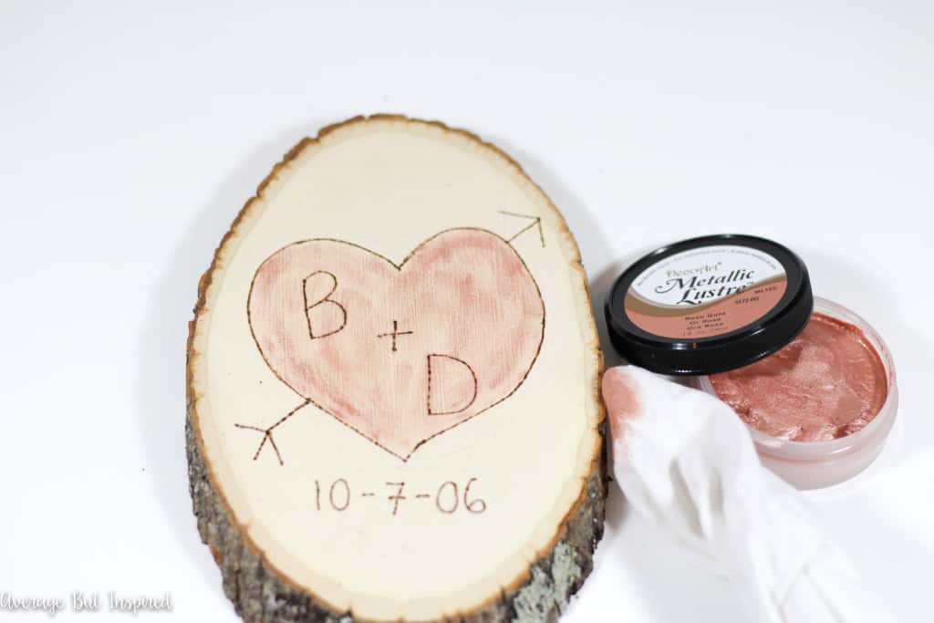 Use Metallic Luster inside the wood burned heart to add some Valentine's Day color.