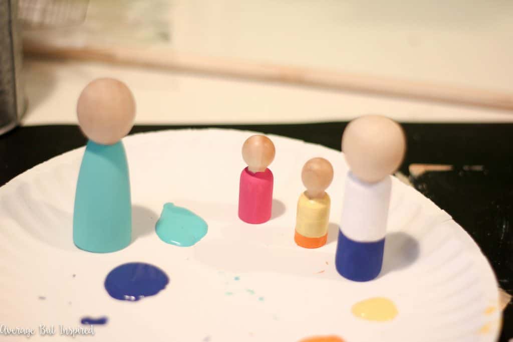 This is so cute! A DIY personalized peg doll family is a fun project! It makes a great addition to a gallery wall and is a perfect, thoughtful gift for any family!