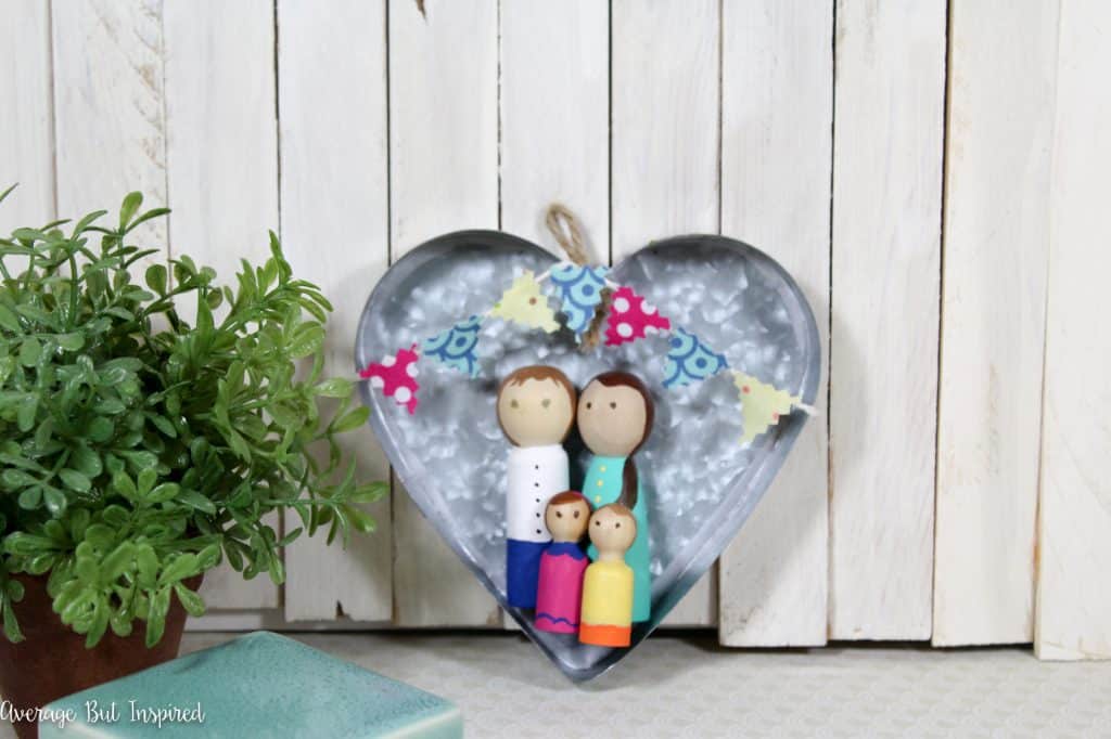 This is so cute! A DIY personalized peg doll family is a fun project! It makes a great addition to a gallery wall and is a perfect, thoughtful gift for any family!