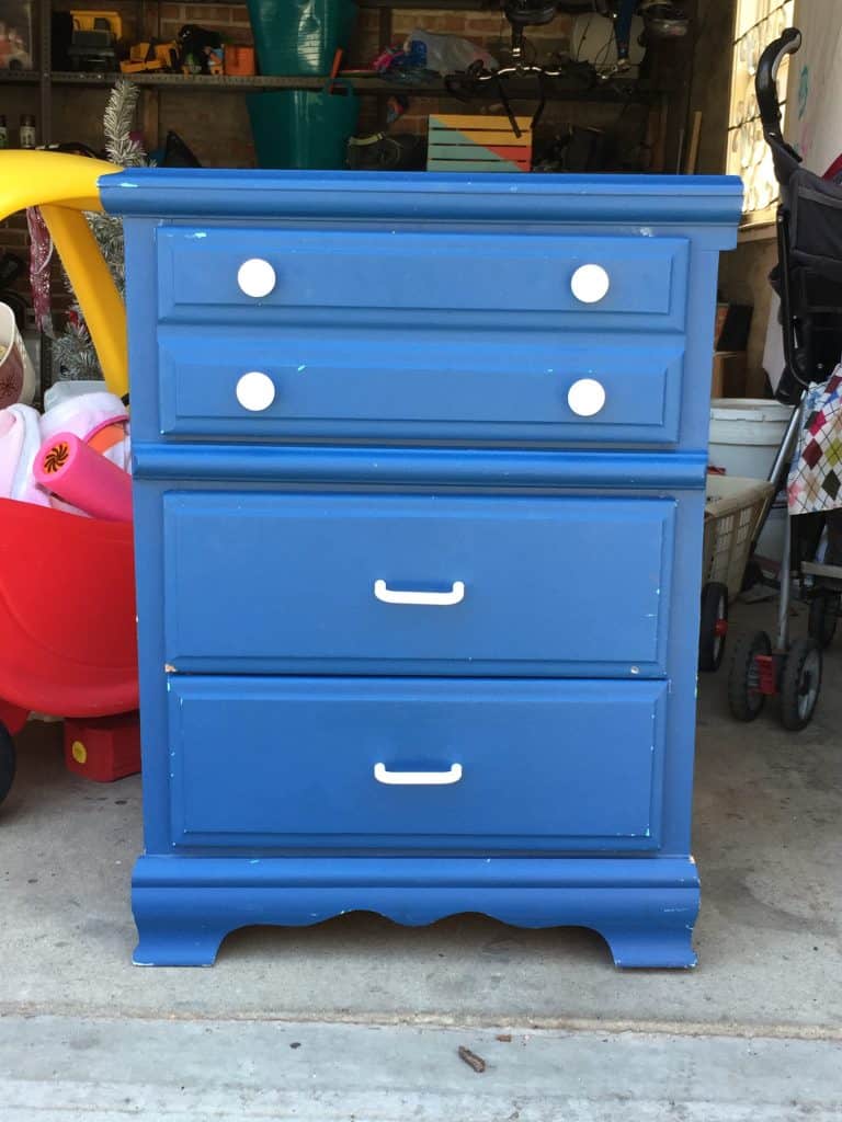 Give an outdated piece of furniture a bold new look! Get all the details on this two-tone turquoise dresser makeover right in this post!
