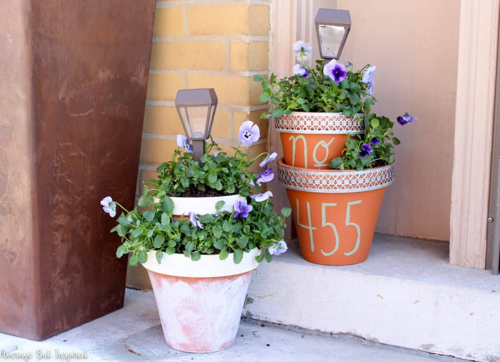 Add some height and light to your planters with these easy DIY Solar Light Planters. Get the full tutorial in this post.