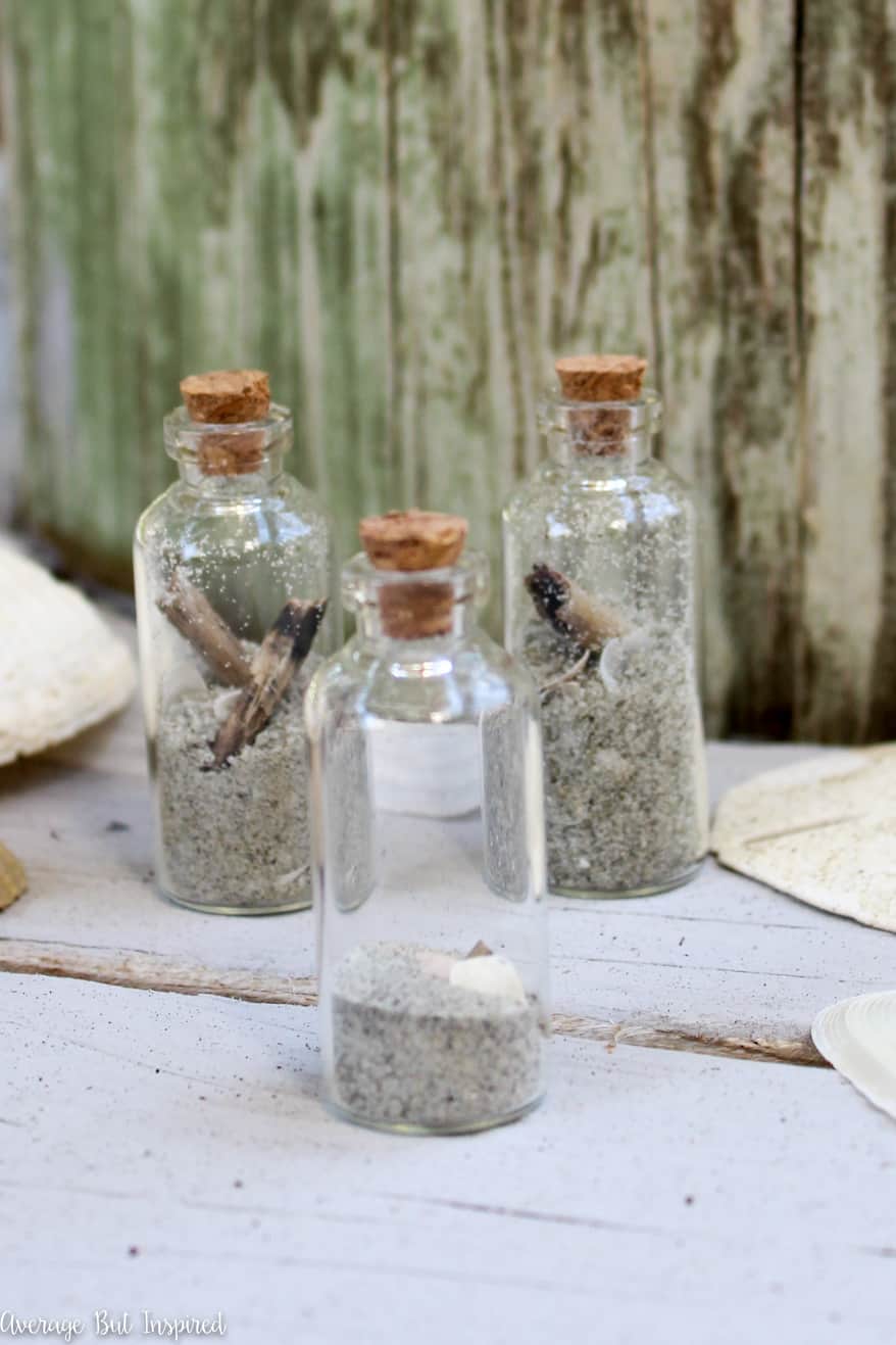 Is a beach vacation in your future? If the answer is yes, bring the beach home with you with this fun Beach in a Bottle DIY Vacation Souvenir! Click through for the tutorial. This beach craft for kids is adorable and fun to make.