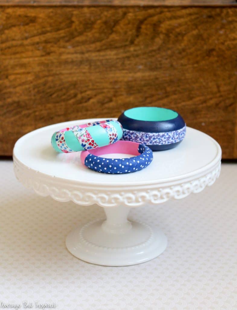 Customize plain wooden bangles with paint and fabric tape for a quick and easy DIY bracelet! Get the full supply list and tutorial in this post.