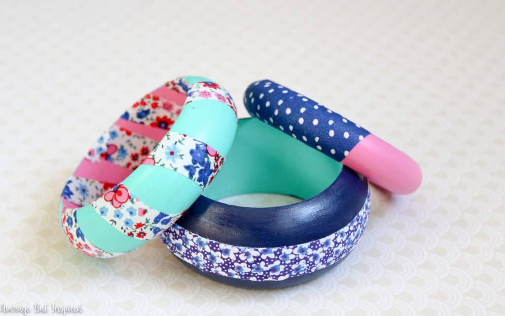 Customize plain wooden bangles with paint and fabric tape for a quick and easy DIY bracelet! Get the full supply list and tutorial in this post.