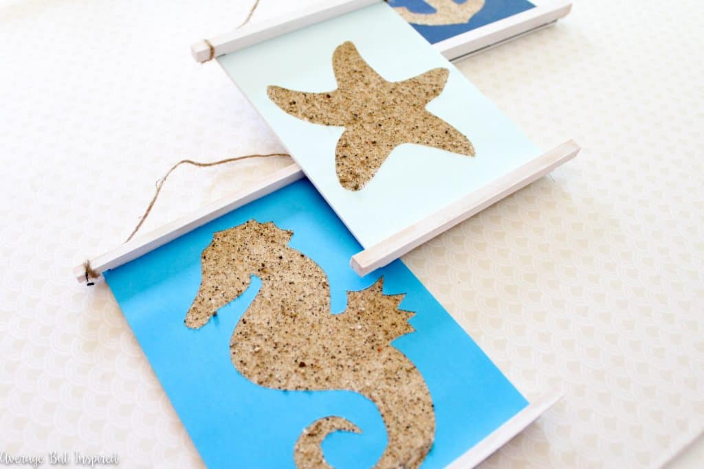 Use sand to create adorable sandy shapes wall art with this fun tutorial! It's a surprisingly low-mess project and it's really easy to make. Get the full tutorial and FREE shape templates in this post.