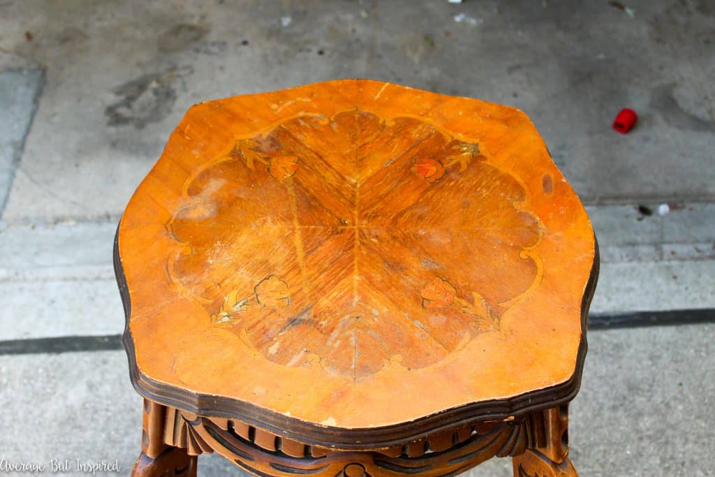 Gorgeous! This side table was found in an alley and given a beautiful makeover with chalky paint and a patterned paper on the tabletop. See all the "before" and "afters" in this post.