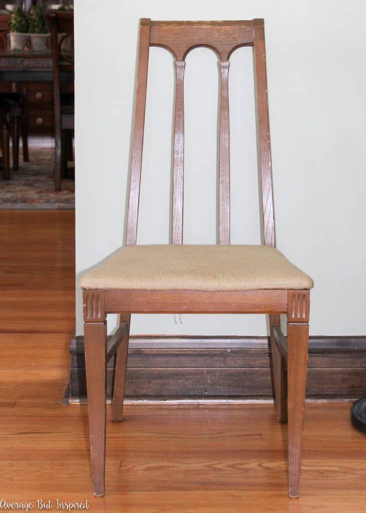 An ugly old chair gets new life with gorgeous paint and a reupholstered leather seat.