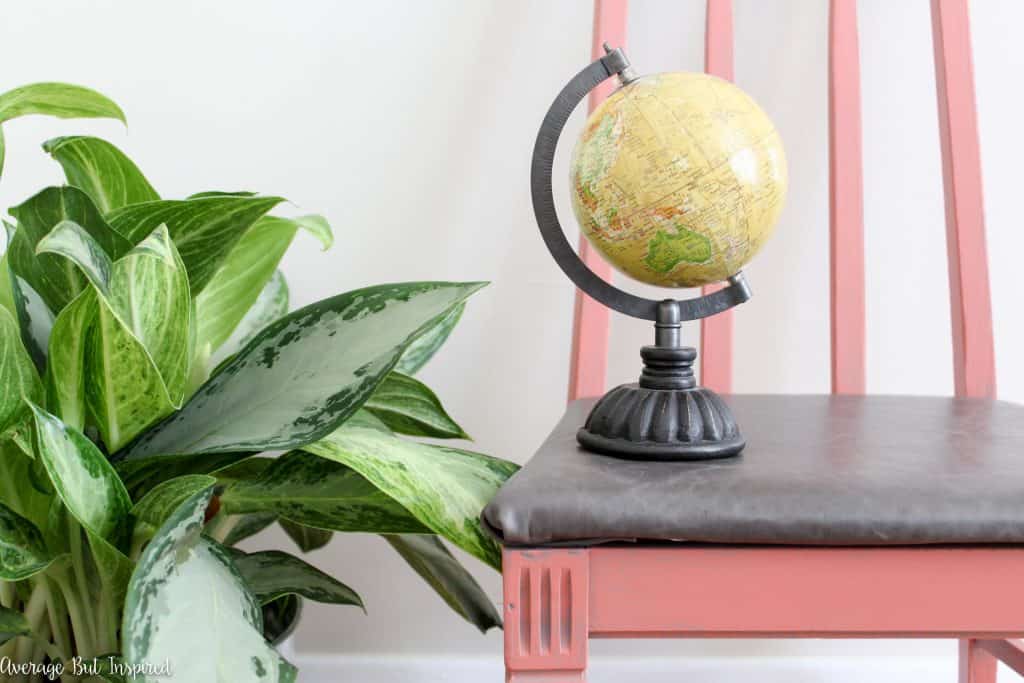 A painted coral chair makeover is made extra gorgeous with a leather upholstery seat.