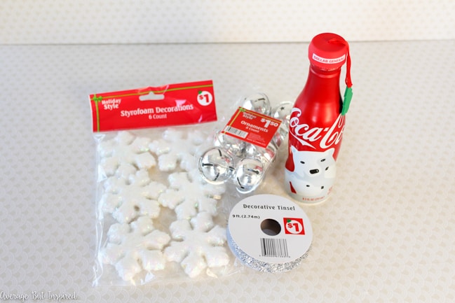 Learn how to transform a Coca-Cola bottle into an ornament for your Christmas tree! Plus, download free printable gift tags in this post!