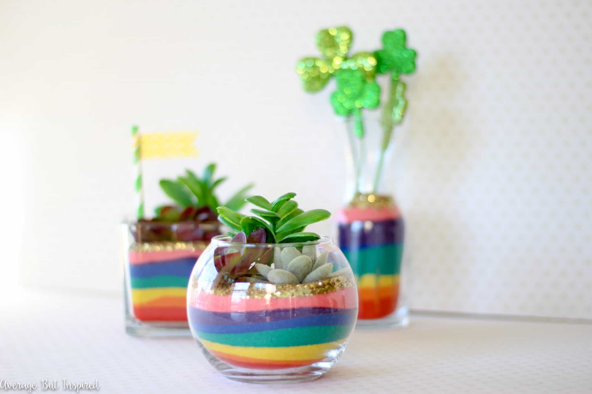 These Rainbow Sand Art Terrariums are sure to put a smile on anyone's face! Add a lot of color to glass vases with colored sand in rainbow hues! A perfect St. Patrick's Day craft for any age!