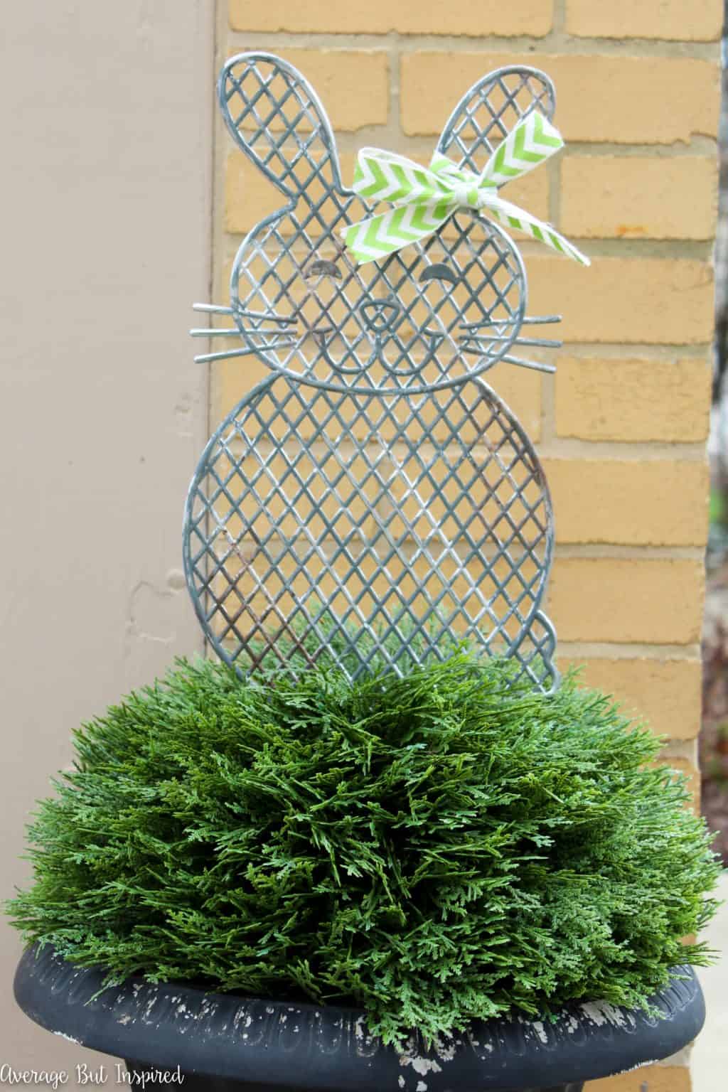 Give plastic dollar store planter stakes a beautiful makeover with a faux metal finish! Learn how to easily upgrade the look of these cute spring decorations in this post.