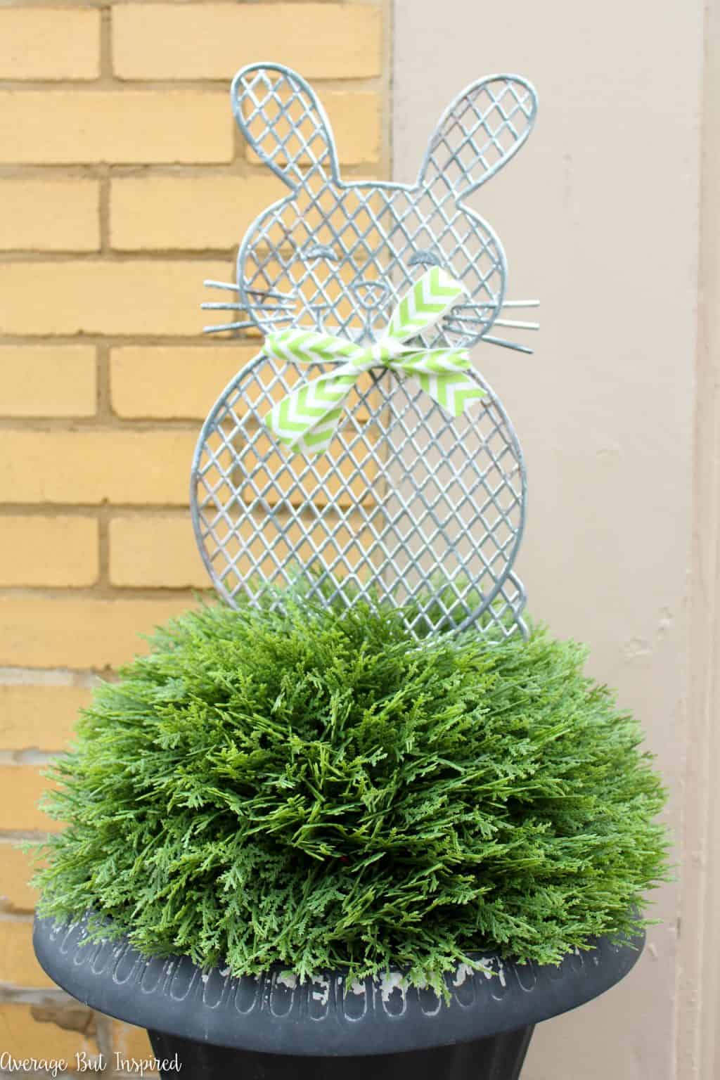 Give plastic dollar store planter stakes a beautiful makeover with a faux metal finish! Learn how to easily upgrade the look of these cute spring decorations in this post.
