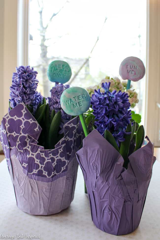 Use lightweight air dry clay to create adorable DIY air dry clay garden markers. Use paint to achieve a marbled air dry clay look and add some spunk to your garden or flower pots this season!