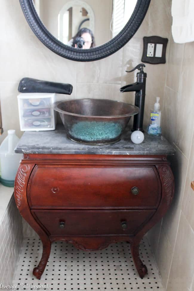 An ugly vanity is painted with Americana Decor Satin Enamels Paint and given new life!