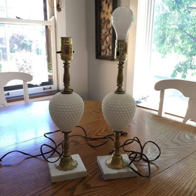 A pair of vintage lamps from the thrift store got an update as part of a stylish dresser makeover.