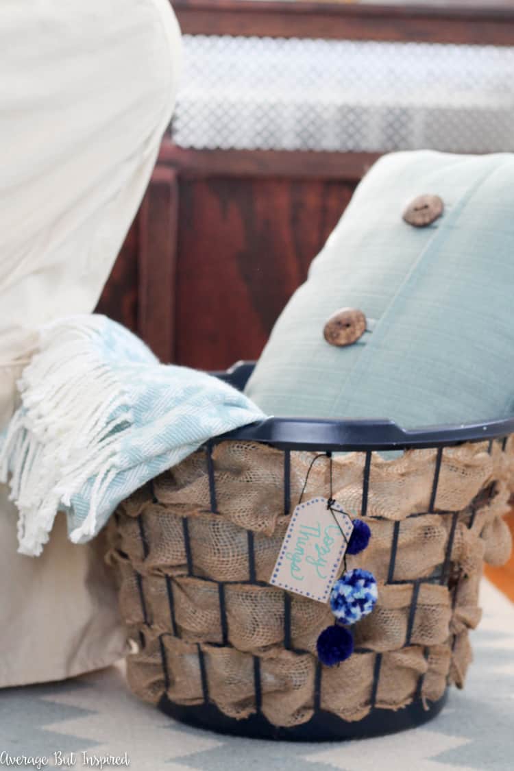 It's easy to transform a dollar store laundry basket into a pretty burlap basket! What a great Dollar Tree craft project!