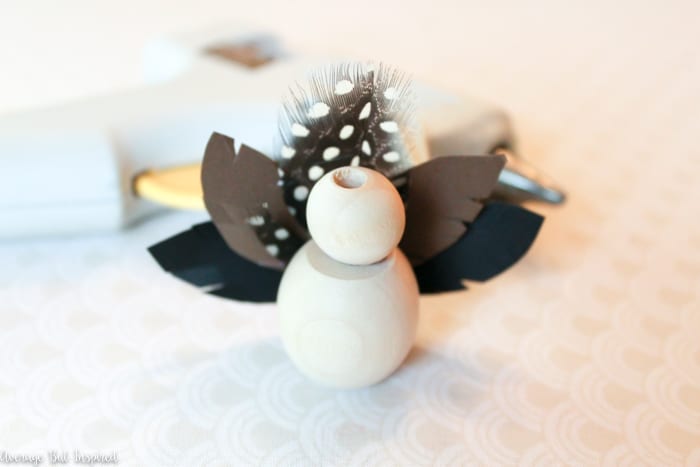 Make adorable Thanksgiving Turkey Place Cards with wooden beads for your Thanksgiving table this year! Learn how to make these DIY Thanksgiving place cards with this easy tutorial! #Thanksgiving #placecards #ThanksgivingTable