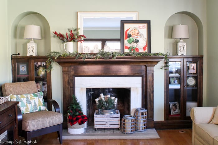 Get the classic Christmas look with traditional red and green decor! A classic Christmas mantel is so easy to put together!