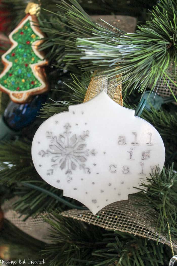 Tile samples can be turned into beautiful ornaments with this tutorial! These upcycled tile Christmas ornaments are so easy to make and fun for all ages! #upcycle #ChristmasCrafts #ChristmasOrnaments