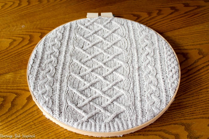 Upcycled sweater embroidery hoop art is a great way to use less-than-perfect sweaters in home decor! Instead of throwing your sweaters away, turn them into art for your home! #embroideryhoop #upcycle #upcycledsweater