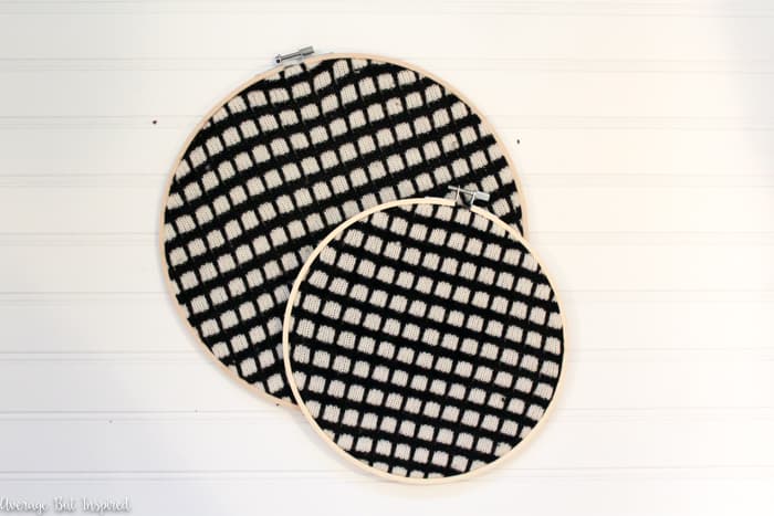 Upcycled sweater embroidery hoop art is a great way to use less-than-perfect sweaters in home decor! Instead of throwing your sweaters away, turn them into art for your home! #embroideryhoop #upcycle #upcycledsweater