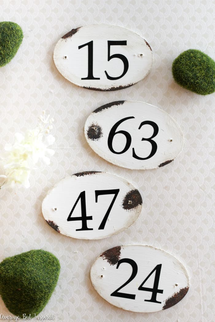 It's so easy to make faux French enamel number tags with inexpensive craft supplies like paint! Learn how to make these French enamel number tags for your home decor and organization projects.