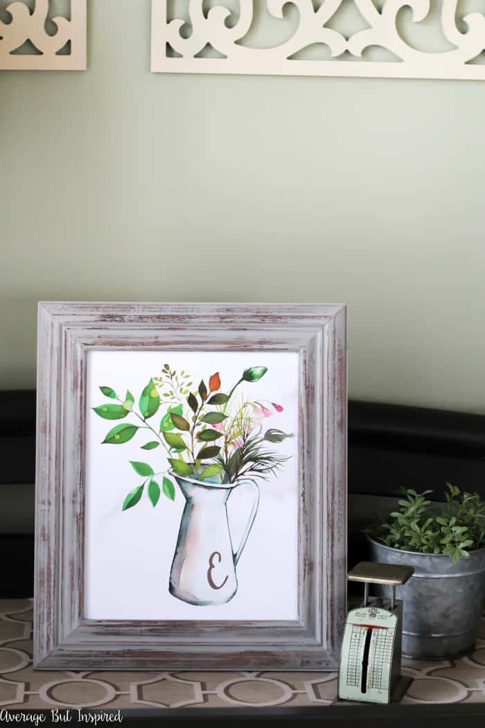 Download this free printable monogram botanical pitcher art to add a personalized and pretty decorative touch to your home! It's available in all 26 letters and is a beautiful watercolor printable filled with greenery and touches of spring.