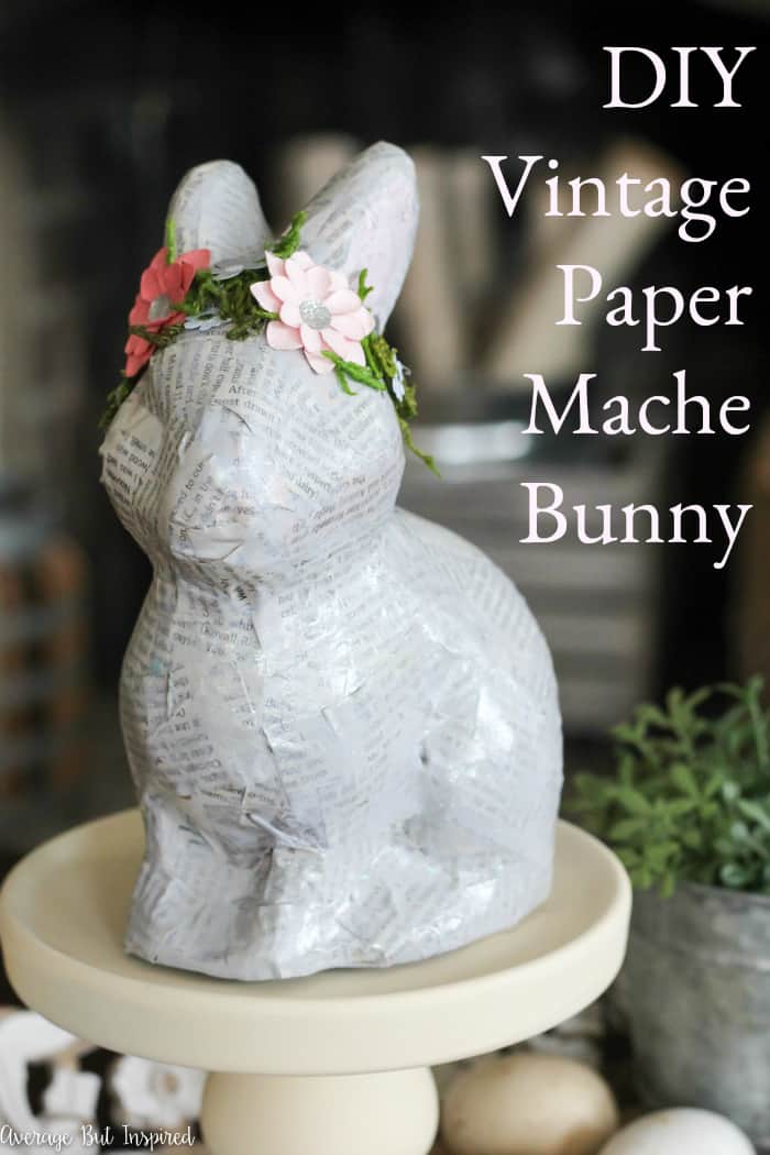 Transform an unfinished paper mache bunny into a charming and pretty vintage paper mache bunny with simple supplies like newspaper and paper flowers. This paper mache bunny will add such a pretty touch to your spring or Easter decor!