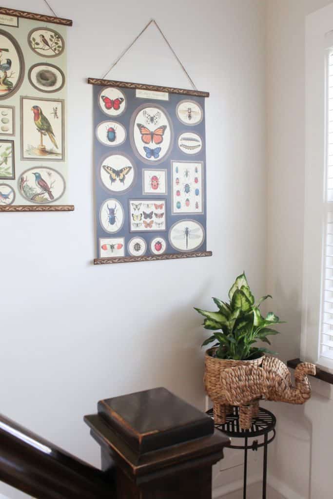 It's so easy to make your own wall art hanger! Perfect for hanging posters, large art, or wrapping paper on a budget!