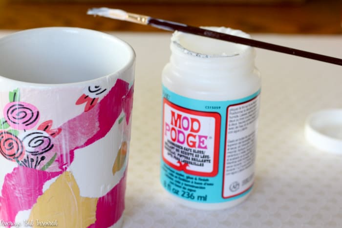 Learn how to make a bold and dishwasher safe DIY Tissue Paper Mug with this easy project tutorial! With just four supplies you can make these adorable DIY coffee mugs that are perfect for inexpensive gifts or girls night craft parties! Anyone can make tissue paper mugs! 