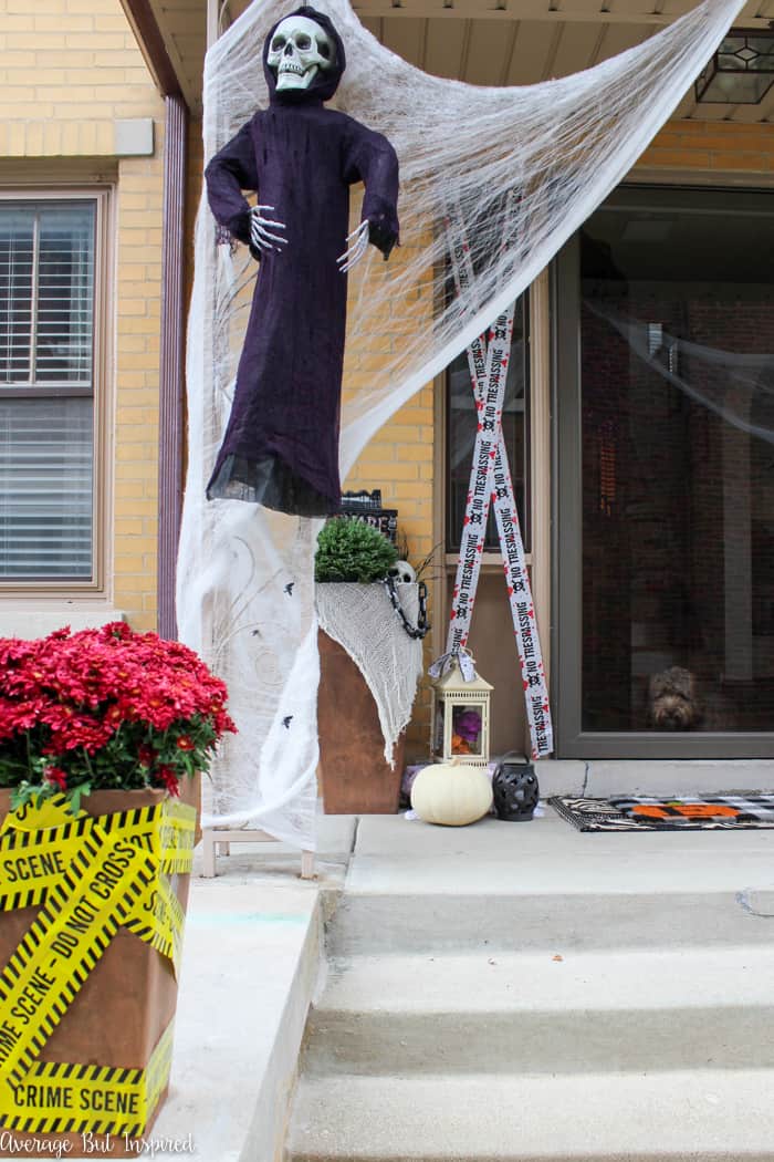 This post is filled with ideas for decorating your porch for Halloween with dollar store items!