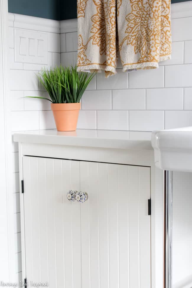 This shallow depth bathroom vanity is an IKEA Silveran hack!