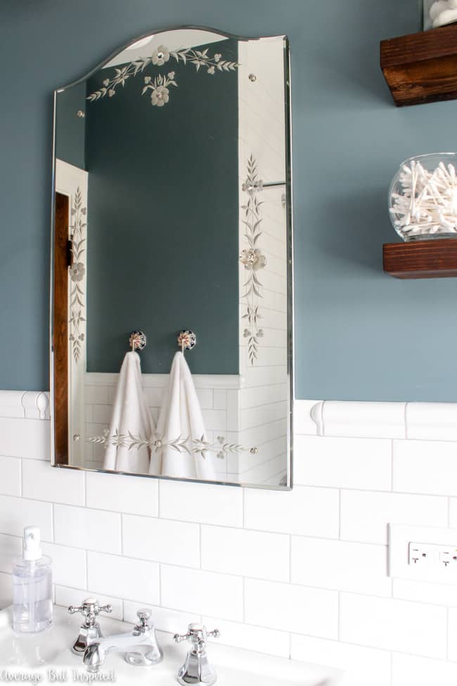 This original 1927 mirrored medicine cabinet is one of the features saved in this bathroom renovation.