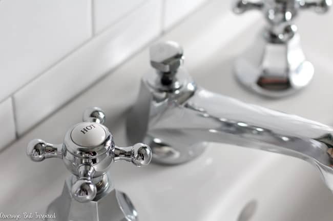 This gorgeous vintage sink faucet makes this 1920s bathroom renovation feel authentic to the time period.