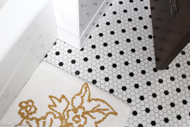 Black and white hexagon mosaic tile with light gray grout looks vintage and fresh at the same time.