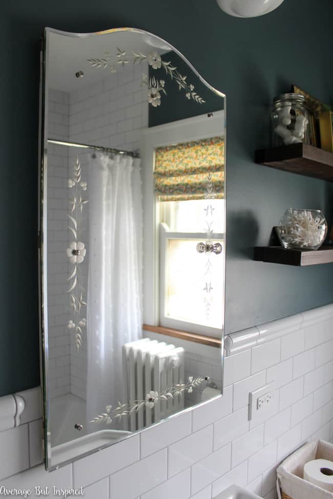 An original 1920s etched glass mirror.