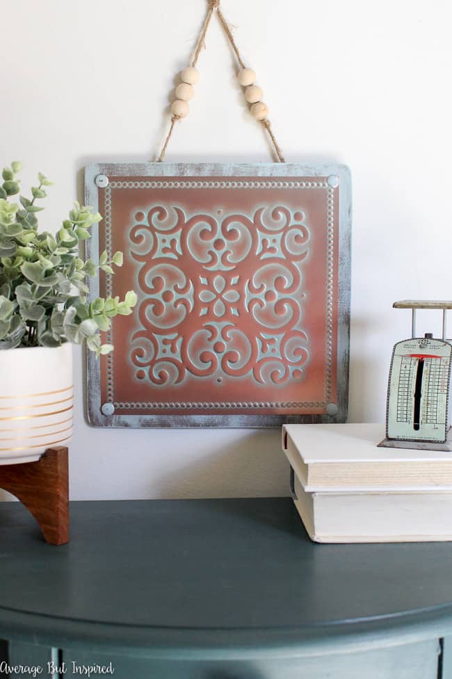 Love it! This post shows you how to make your own vintage tin tile wall art with supplies from Dollar Tree. Seriously!