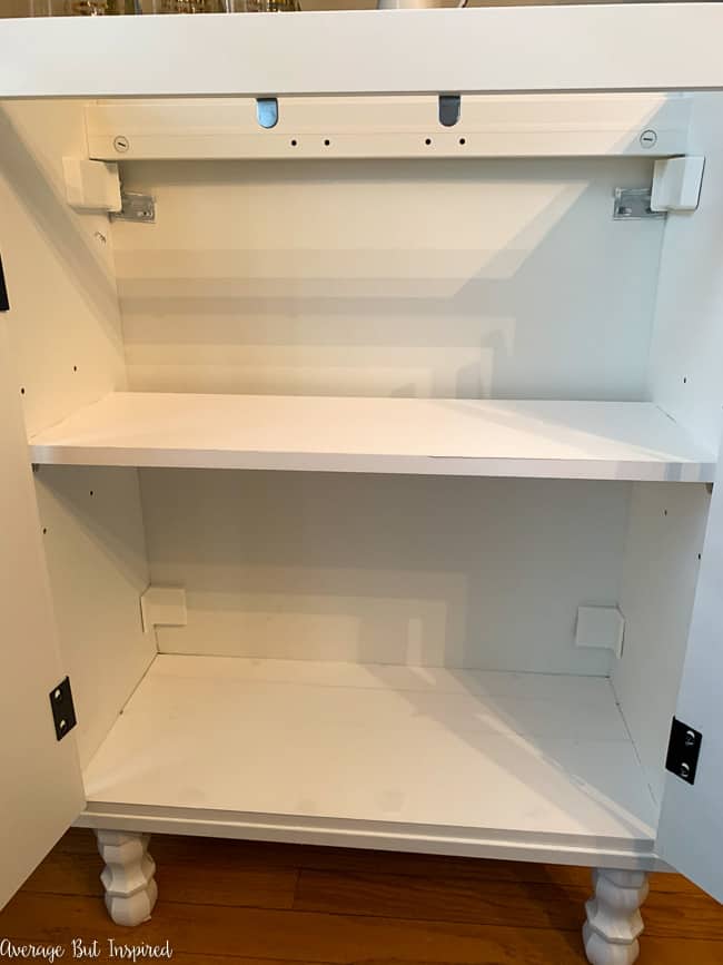 Add prefinished shelving to the IKEA Silveran sink cabinet for more functional storage.