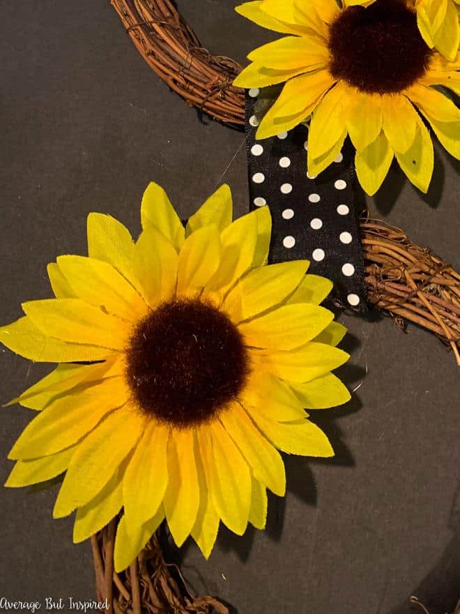 Use Dollar Tree sunflowers to make a beautiful end-of-summer wreath.