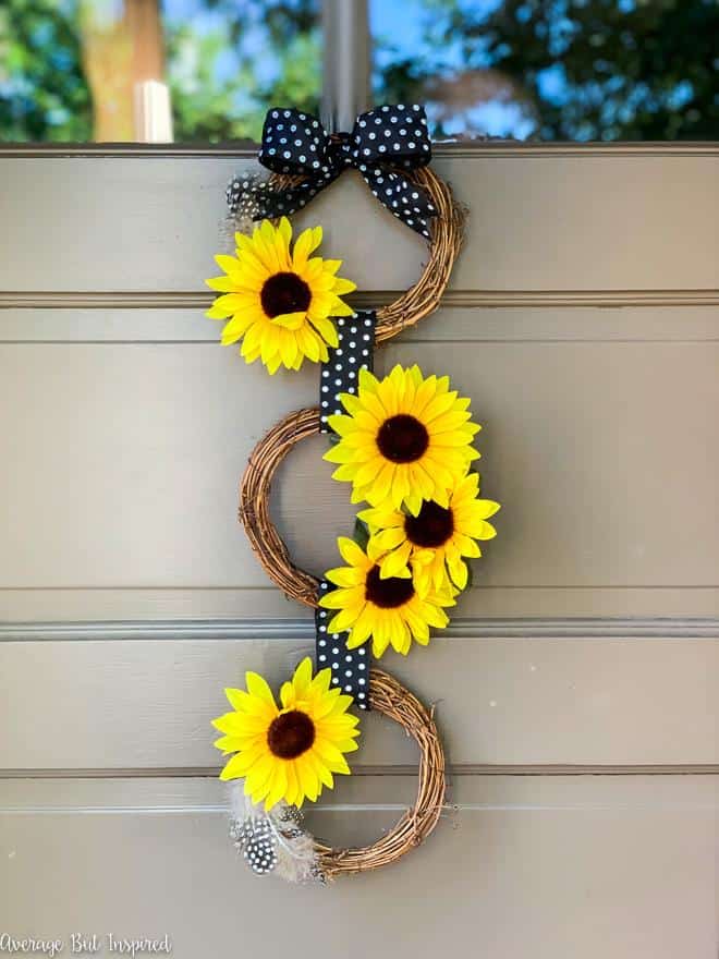 Create gorgeous end-of-summer decor with this DIY Dollar Tree Sunflower Wreath project! Make this pretty sunflower wreath for about $5.