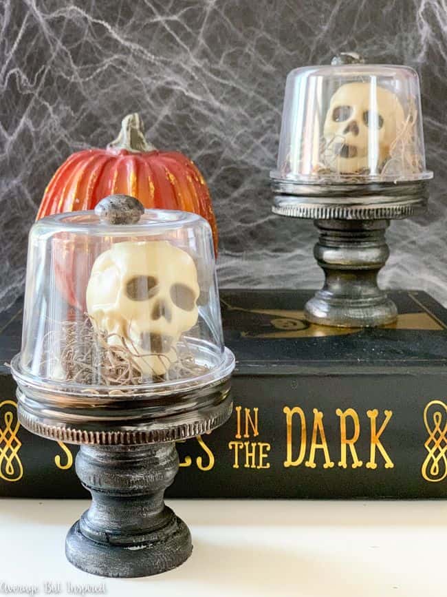 This Halloween skull decoration is creepy and cute at the same time! Make a Halloween cloche with miniature skulls in under 20 minutes! 