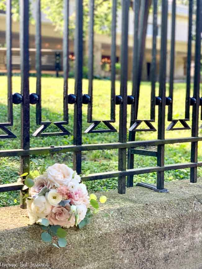 Flowers from this beautiful wedding bouquet were pressed in a book and preserved in glass.