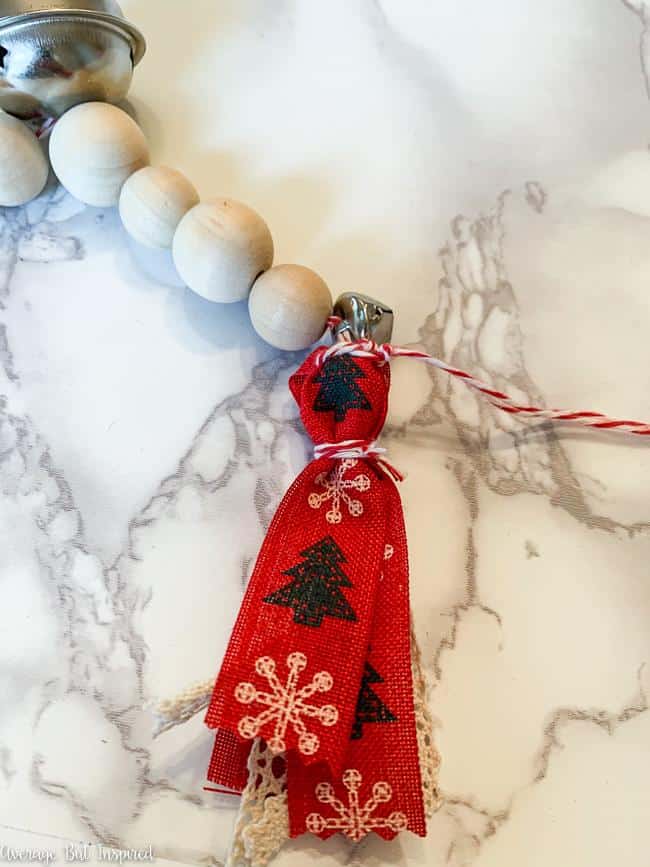 How to Make a Jingle Bell Wood Bead Garland for Christmas